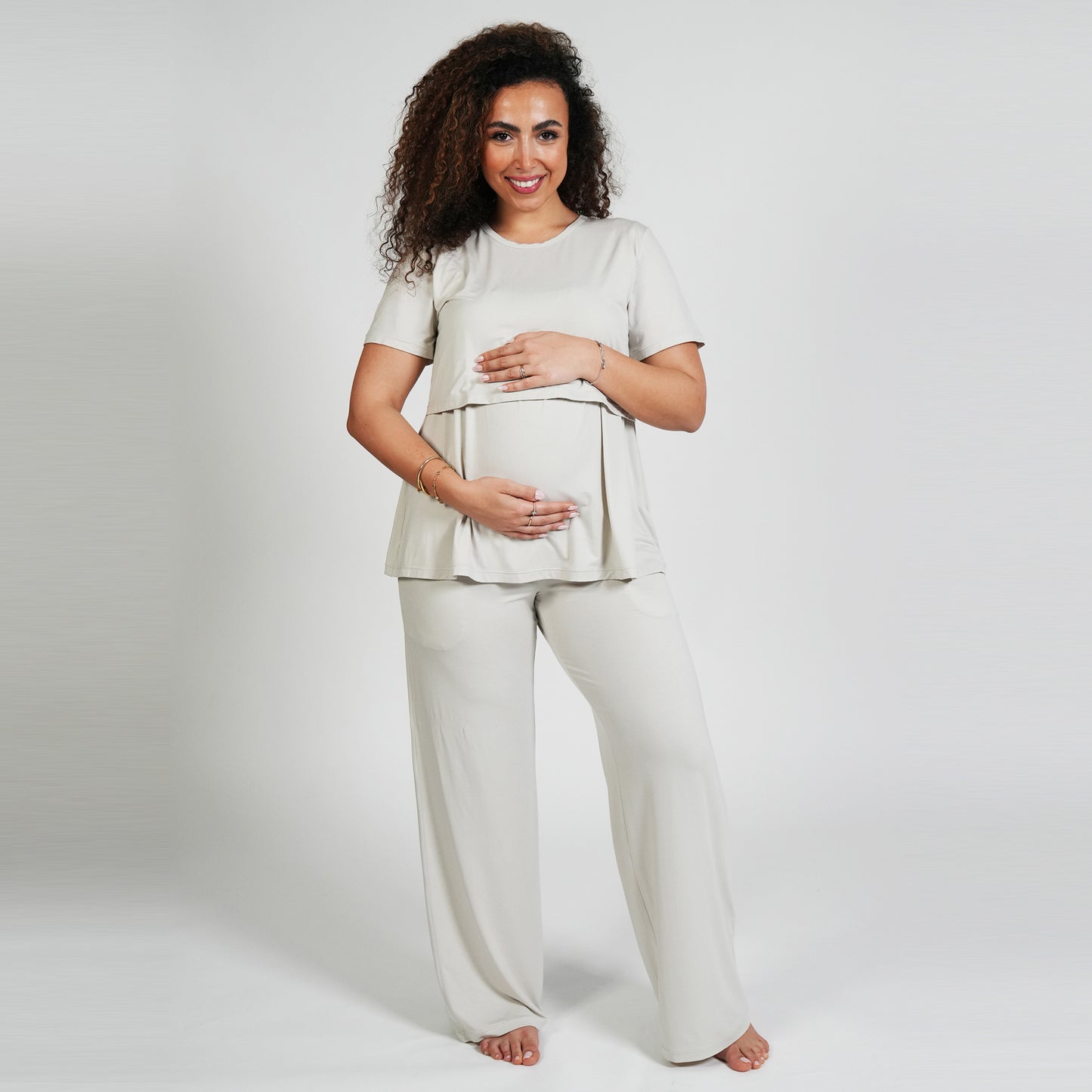 Beige maternity tee designed for growing comfort