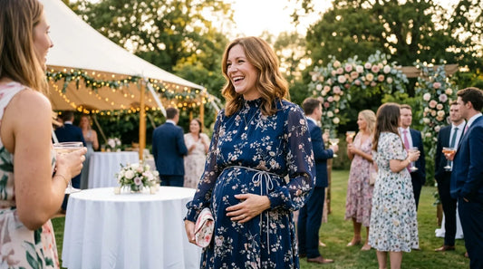 mom in maternity dress at wedding