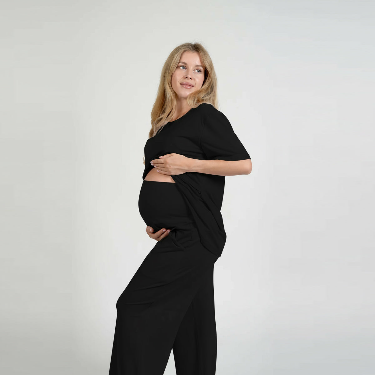 Black maternity pants designed for support and comfort